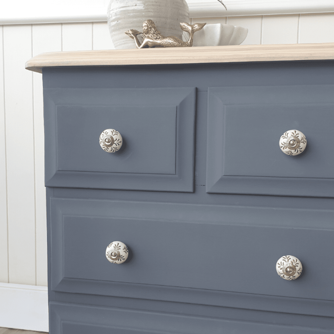 white ceramic knob paired with coastal style furniture